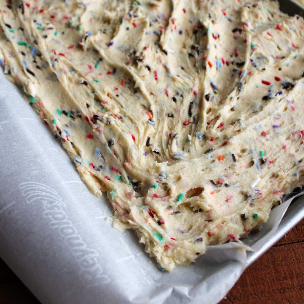 Sprinkle filled cookie dough pressed into sheet pan.