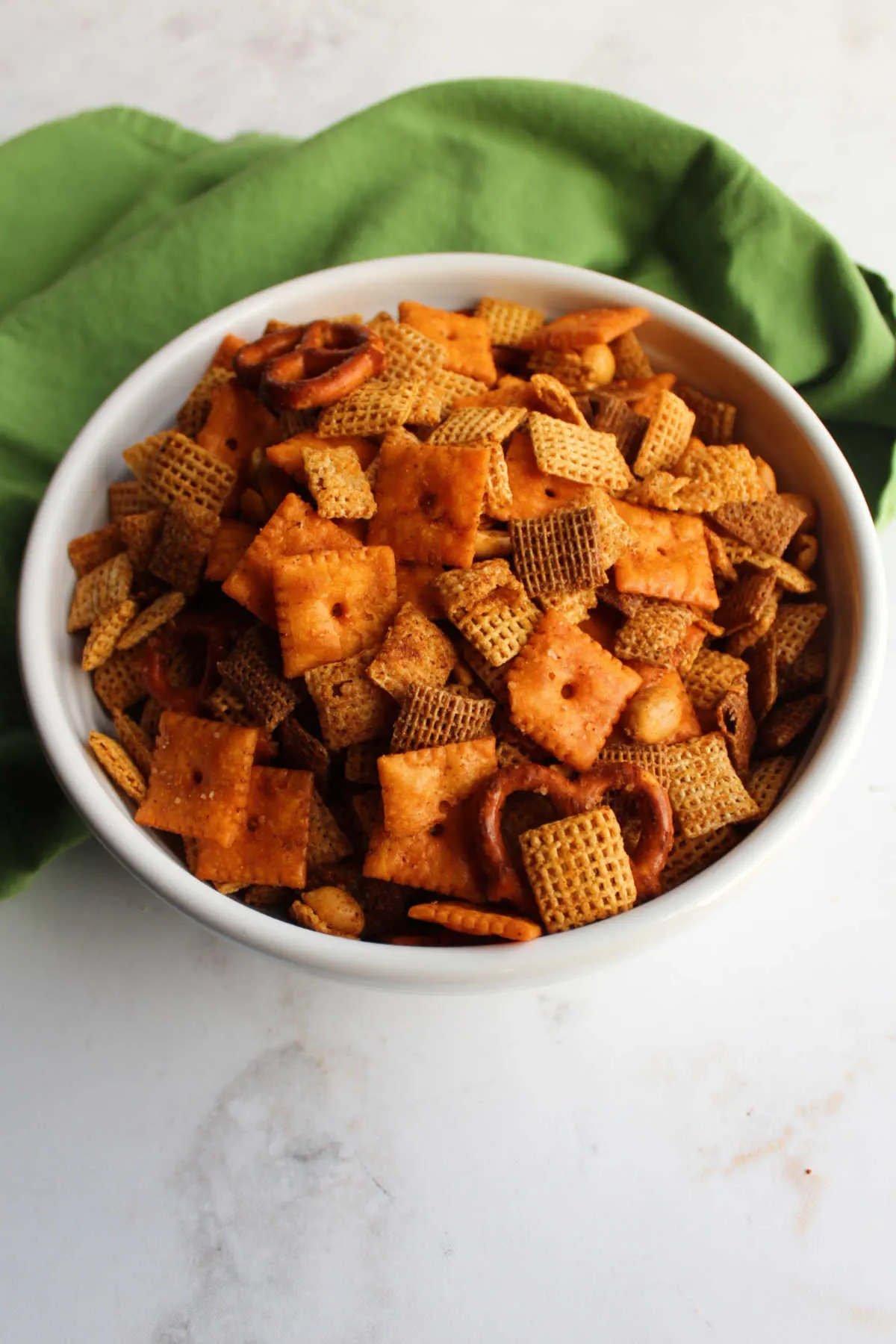 Bowl of chex mix made with taco seasoning, cheese crackers etc. ready to eat.