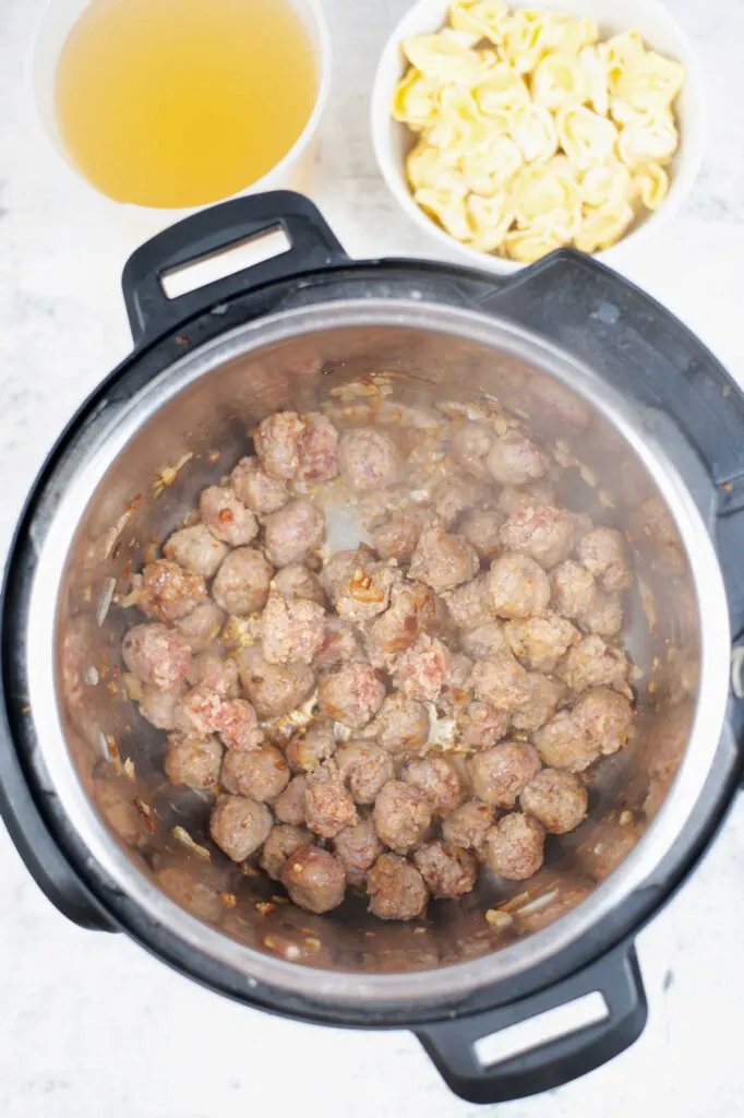 Browned sausage in instant pot.