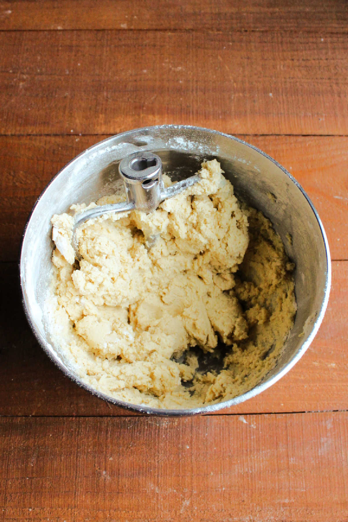 Mixer bowl filled with maple snickerdoodle dough.