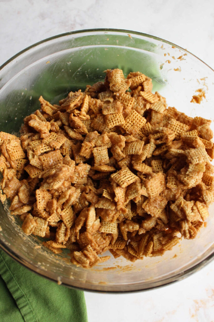 Bowl of Chex cereal coated in maple cinnamon peanut butter mixture.