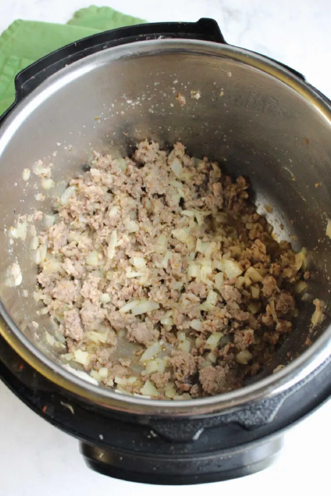 Browned Italian sausage and onions in instant pot.