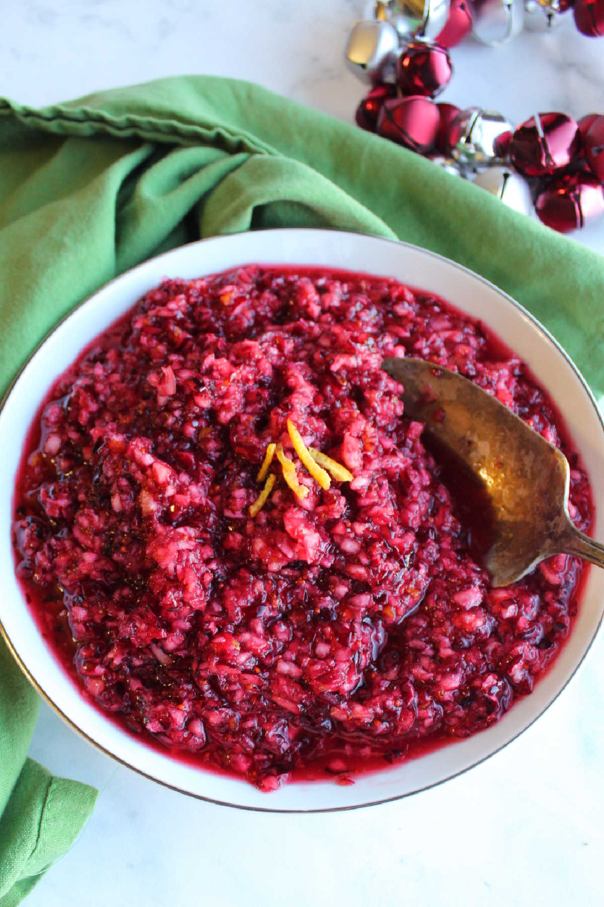 Bowl of fresh cranberry and orange relish ready to serve. 