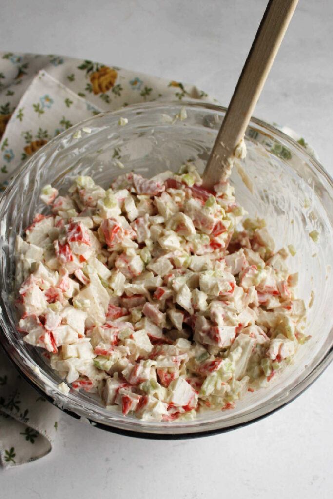 Mixing bowl filled with freshly made crab salad.