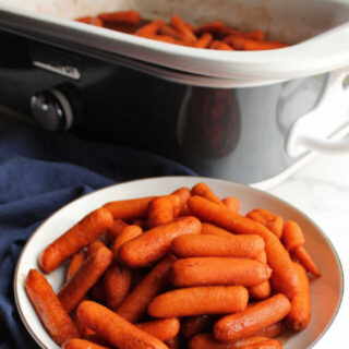 Serving cinnamon and honey glazed carrots out of crockpot.