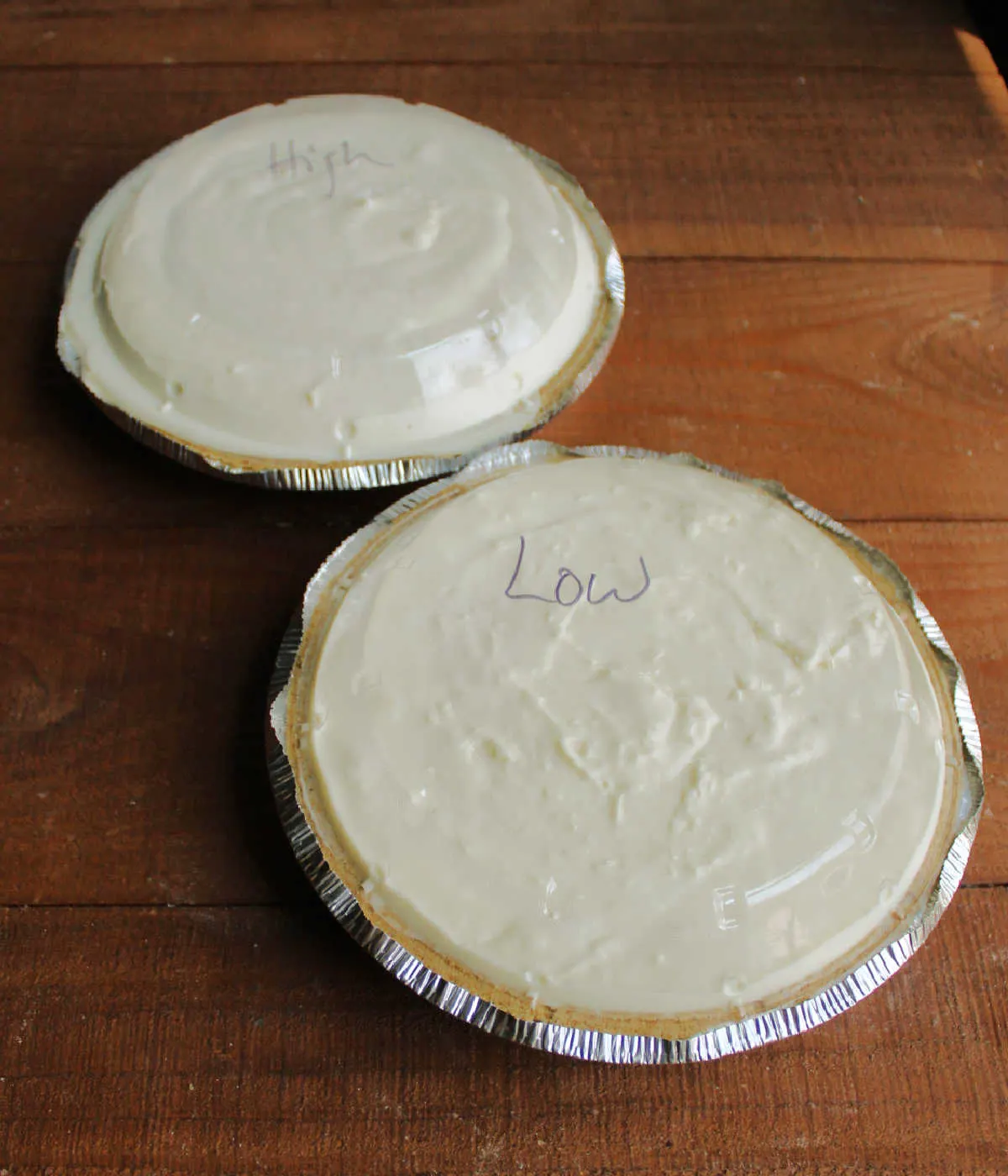 Two no baked cheesecake, one that was mixed on low and the other that was beaten on high.