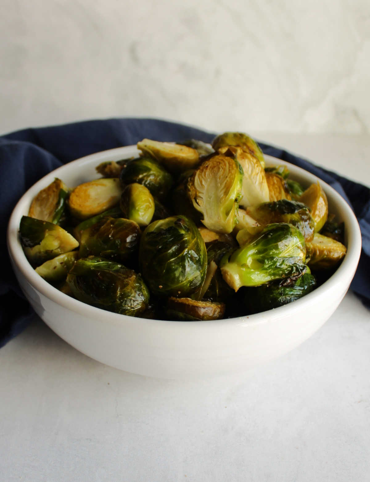 Bowl of oven roasted brussels sprouts, ready to eat. 