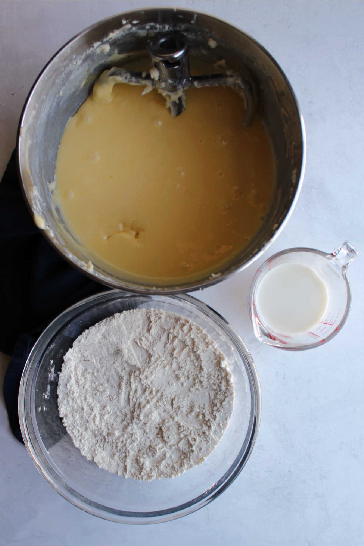 Wet and dry ingredients ready to be made into petit four cake batter. 