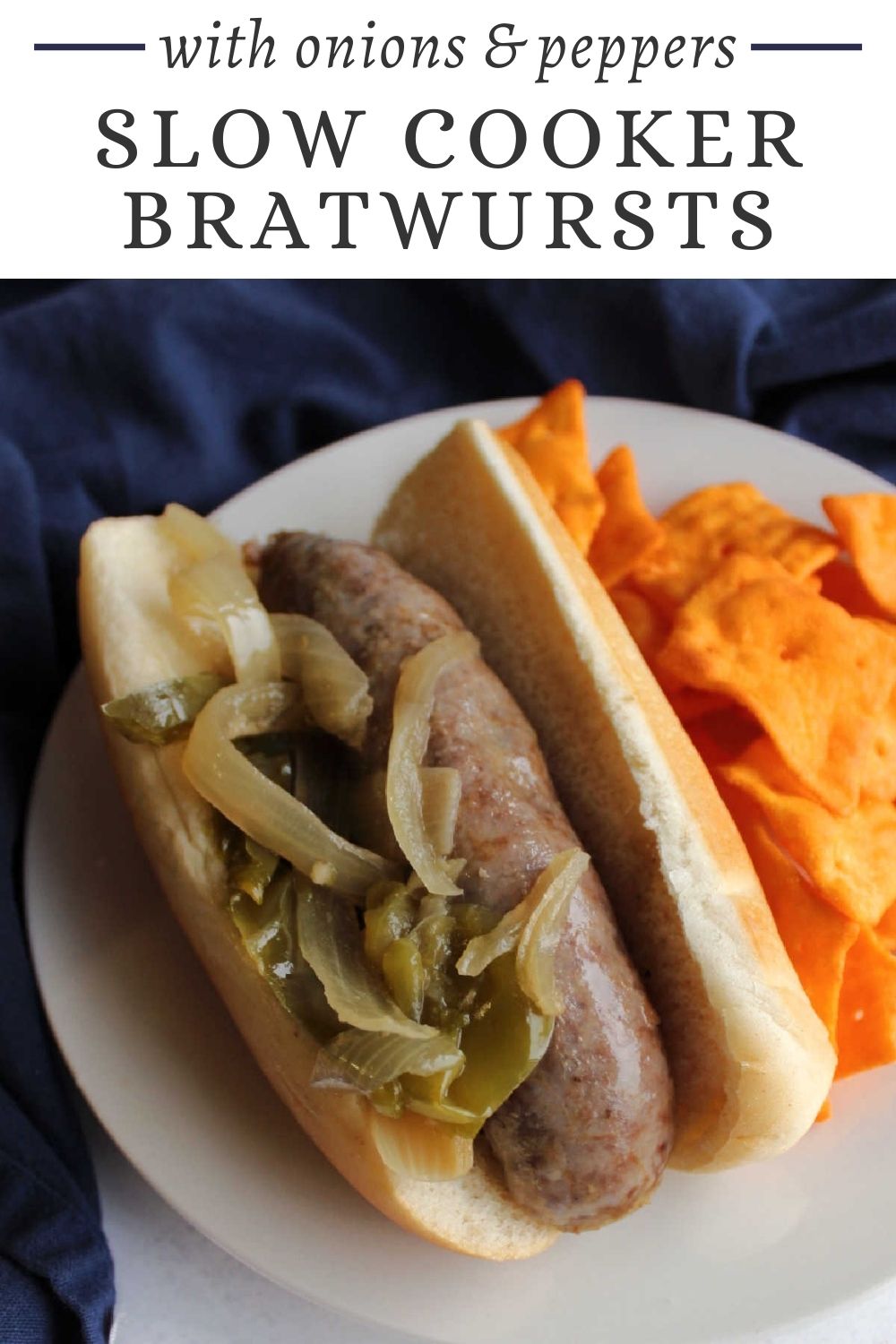 Slow cooker brats are a perfectly busy day dinner entree. Put one on a bun and pile it up with the peppers and onions for a tasty and easy meal.