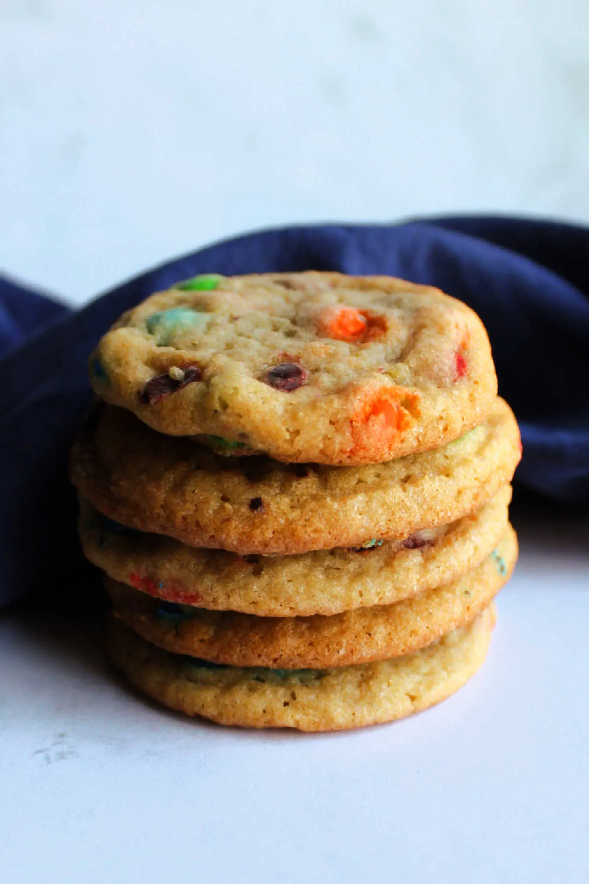 Stack of M&M cookies.