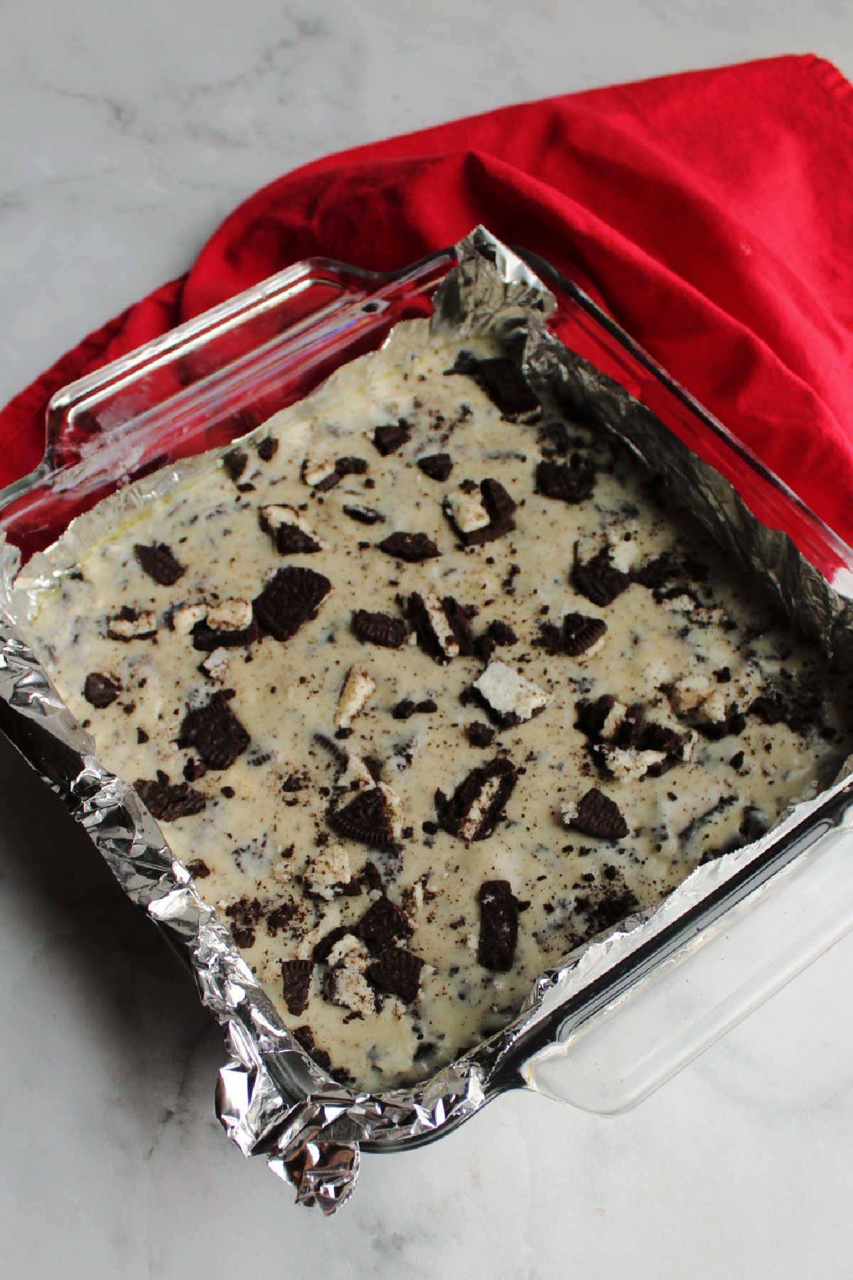 Pan of cookies and cream fudge ready to chill.