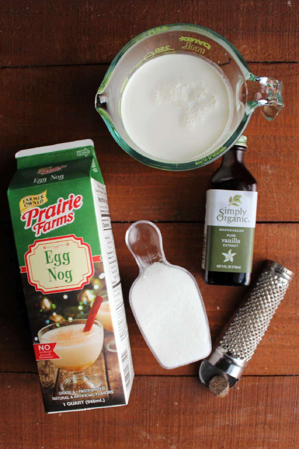 Ingredients: eggnog, sugar, half and half, vanilla and nutmeg ready to be made into ice cream. 