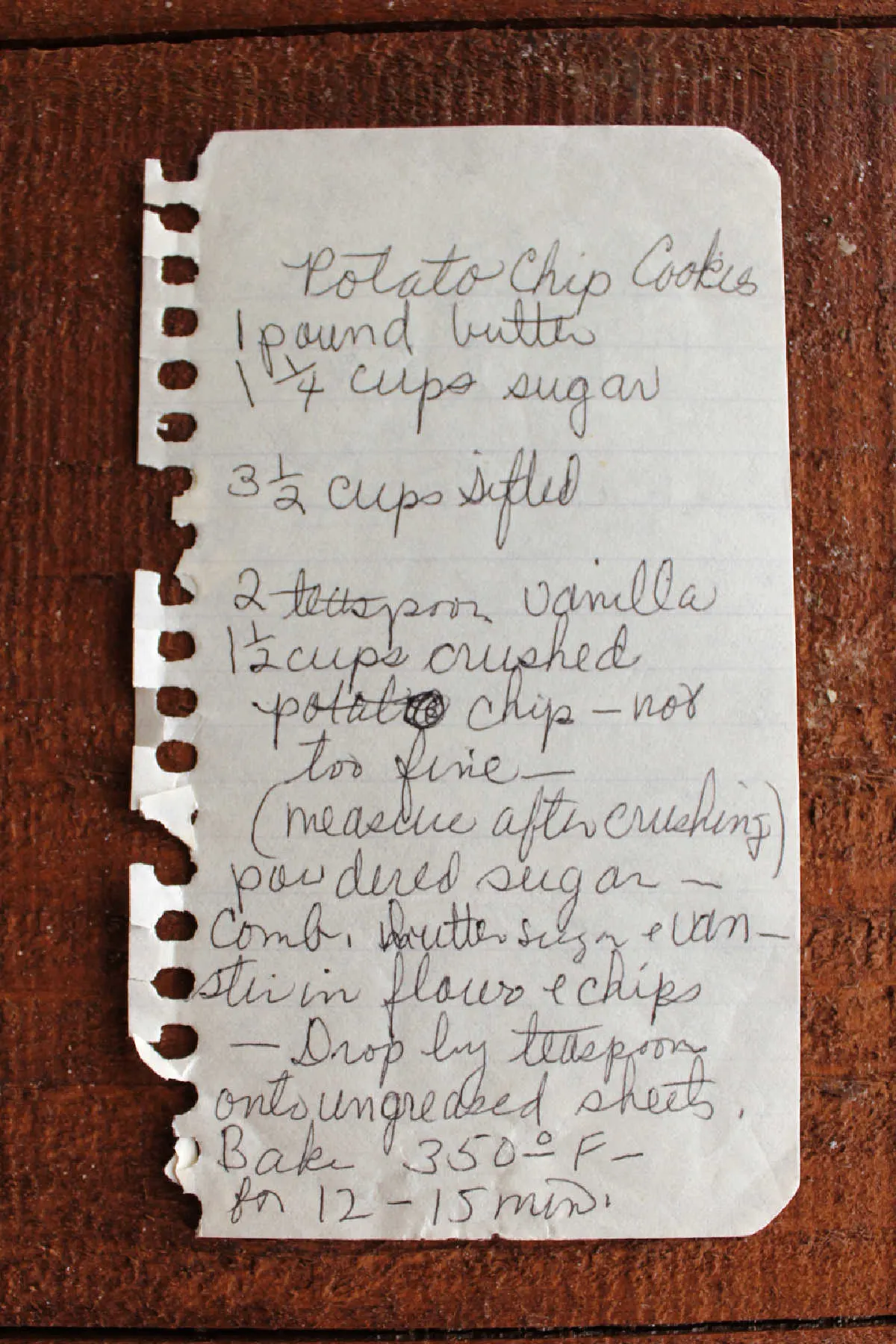 Handwritten potato chip cookie recipe on piece of small notepad paper.