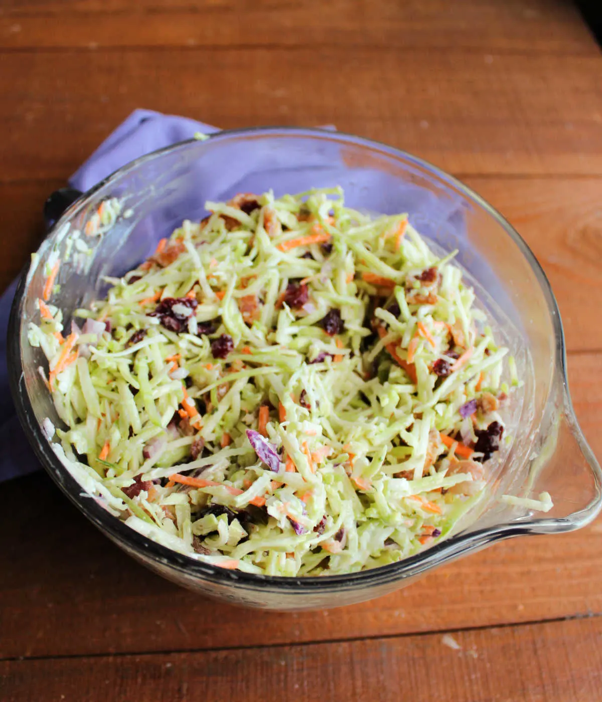 Freshly mixed broccoli slaw, ready to go in the refrigerator to chill.