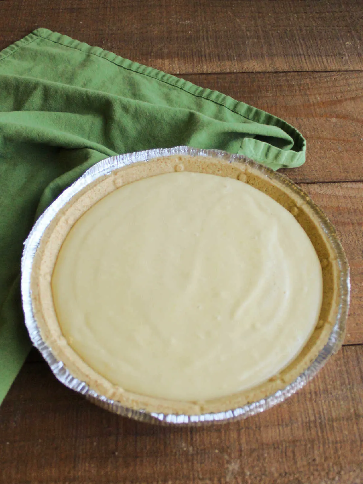 Key lime pie ready to go in the oven.