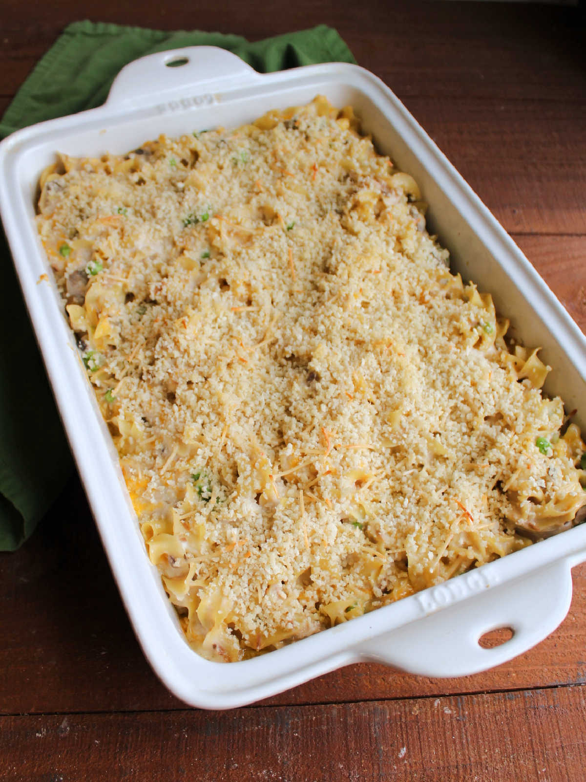 Freshly baked tuna noodle casserole showing browned bread crumb topping.
