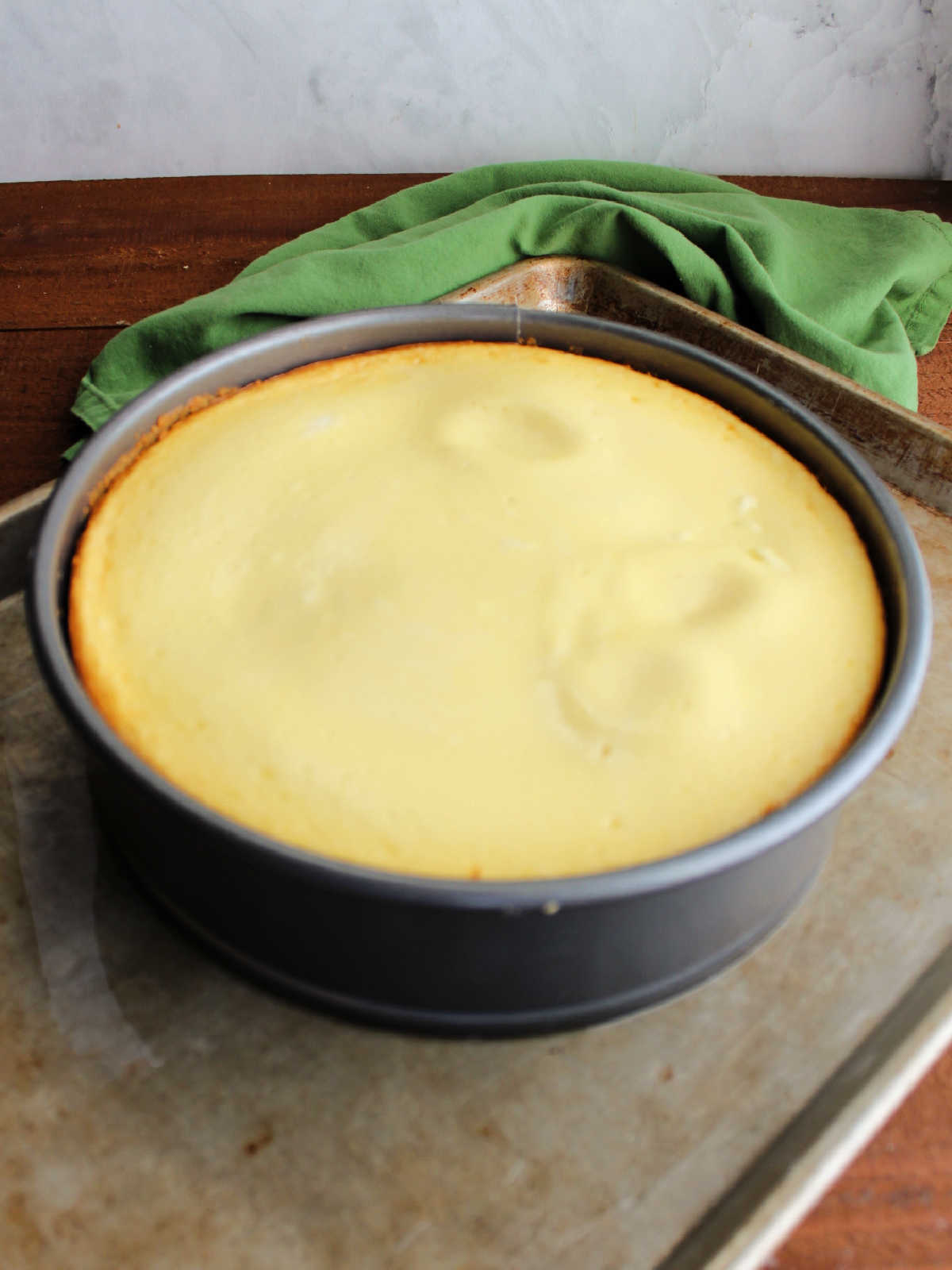 Baked cheesecake fresh from the oven. 