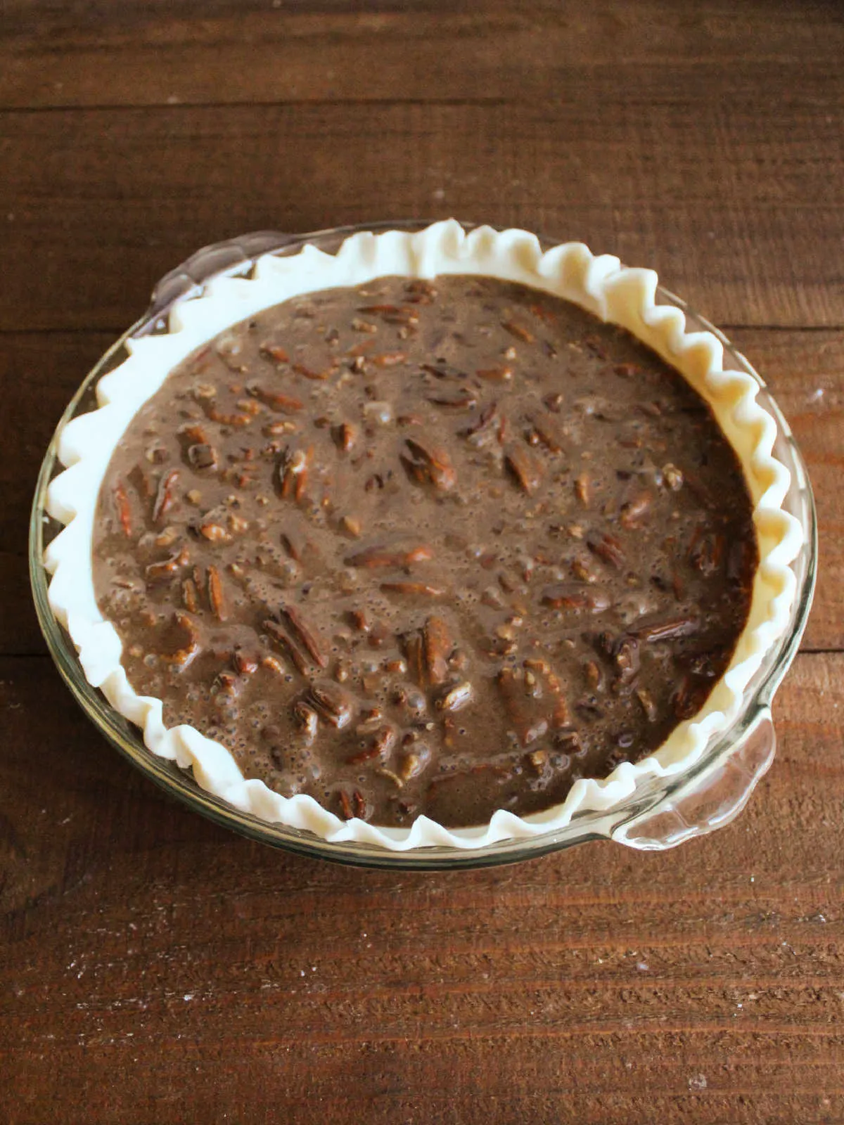 Chocolate condensed milk pie, ready to go in the oven.