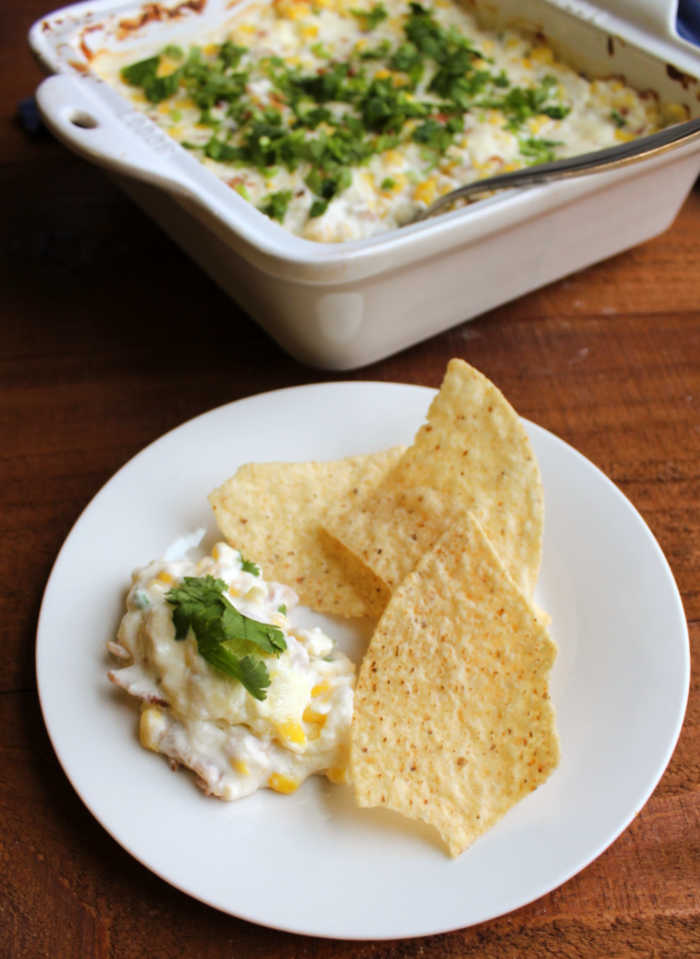 kickin' corn dip on plate with tortilla chips ready to eat.