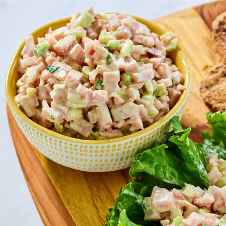 Ham Salad 3 Bowl of ham salad with diced ham and celery in creamy dressing, ready to serve.