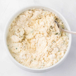 Crockpot Chicken and Dumplings 13 Bowl of thick dumpling mixture ready to be added to crockpot to make dumplings.