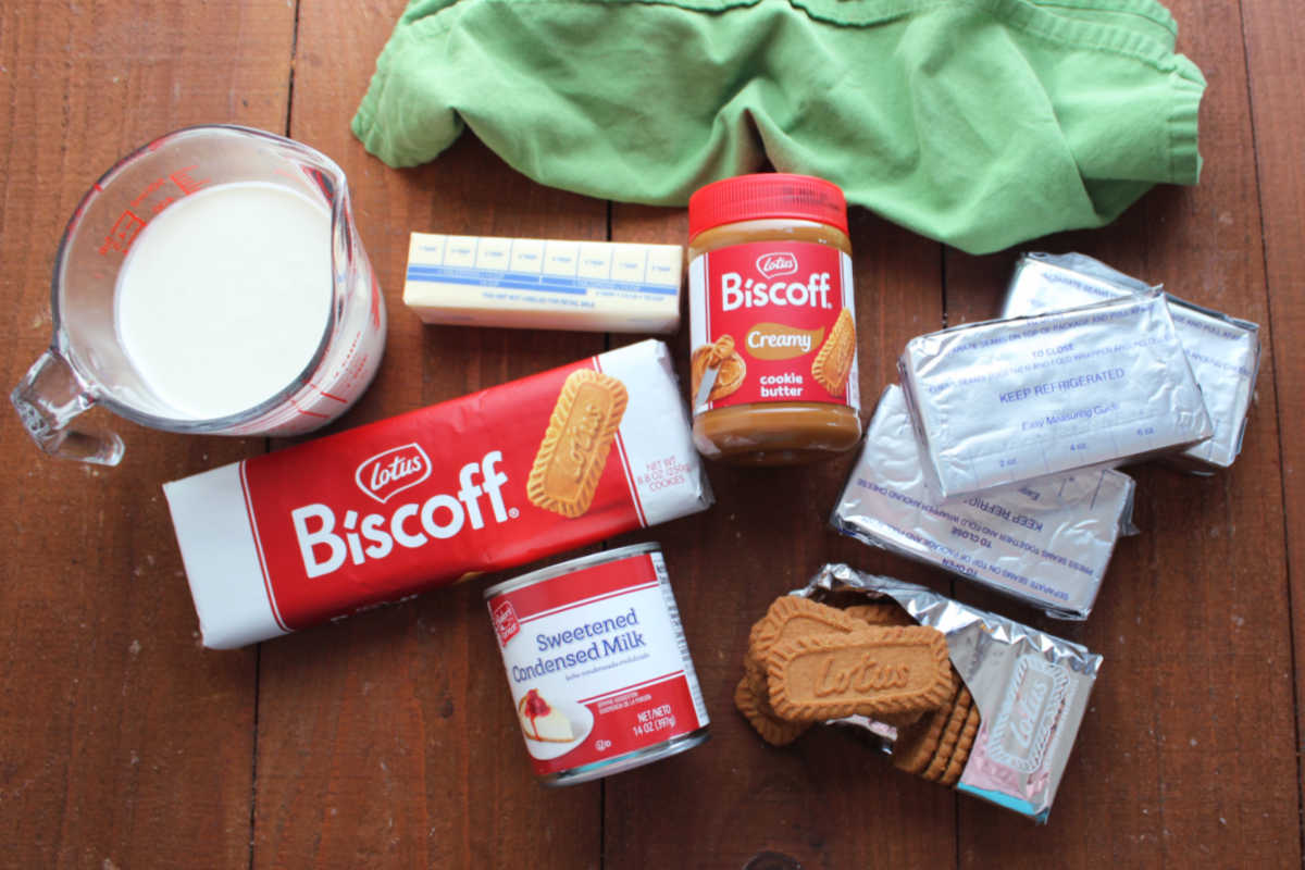 No Bake Biscoff Cheesecake Jars 6 Ingredients including Biscoff cookies, cookie butter, cream cheese, sweetened condensed milk, butter, and heavy cream ready to be made into no bake cookie butter cheesecake cups.