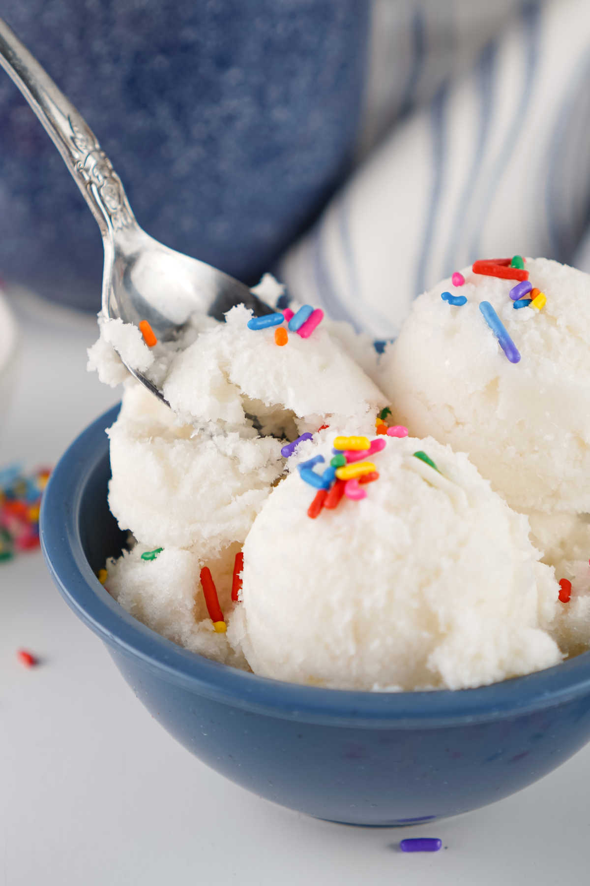 Spoon getting a bite of homemade snow ice cream, ready to eat. 