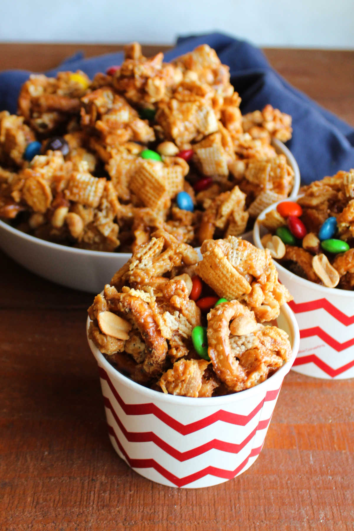 Peanut Butter Chex Mix 9 Dishes of peanut butter Chex mix with M&Ms, ready to eat.