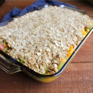 Pan of peach rhubarb crisp ready to go in the oven.