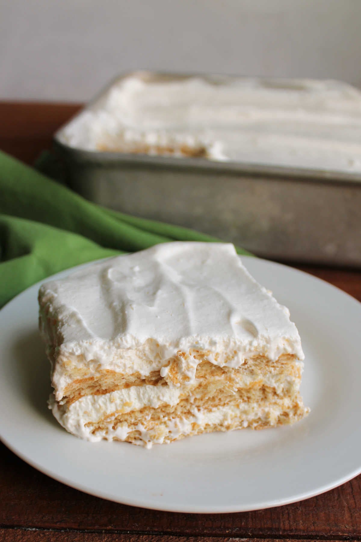 Serving of key lime icebox cake on plate, ready to eat. 