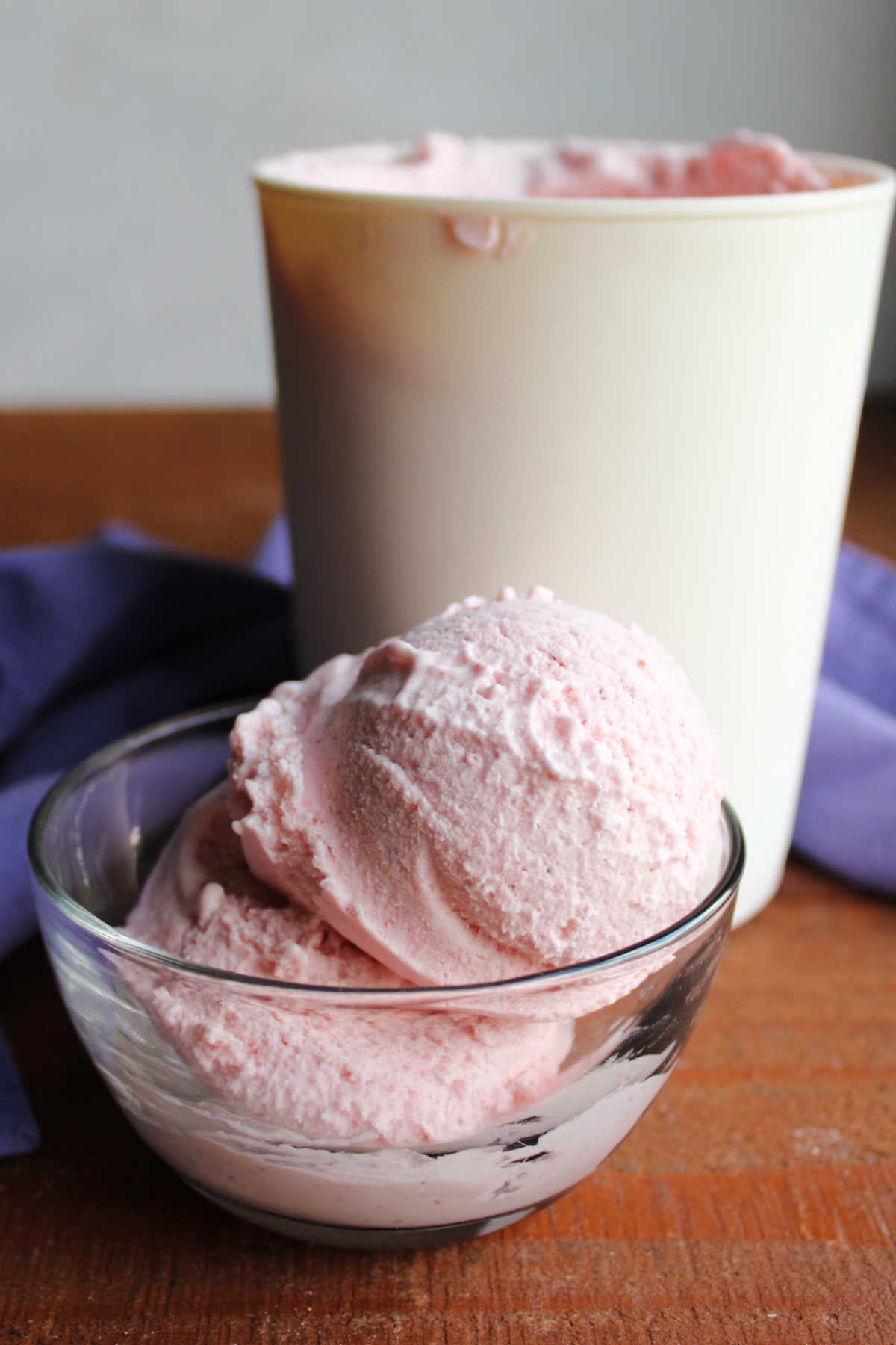 Homemade Strawberry Ice Cream Without Eggs 11 Bowl with two scoops of creamy strawberry ice cream, ready to eat.