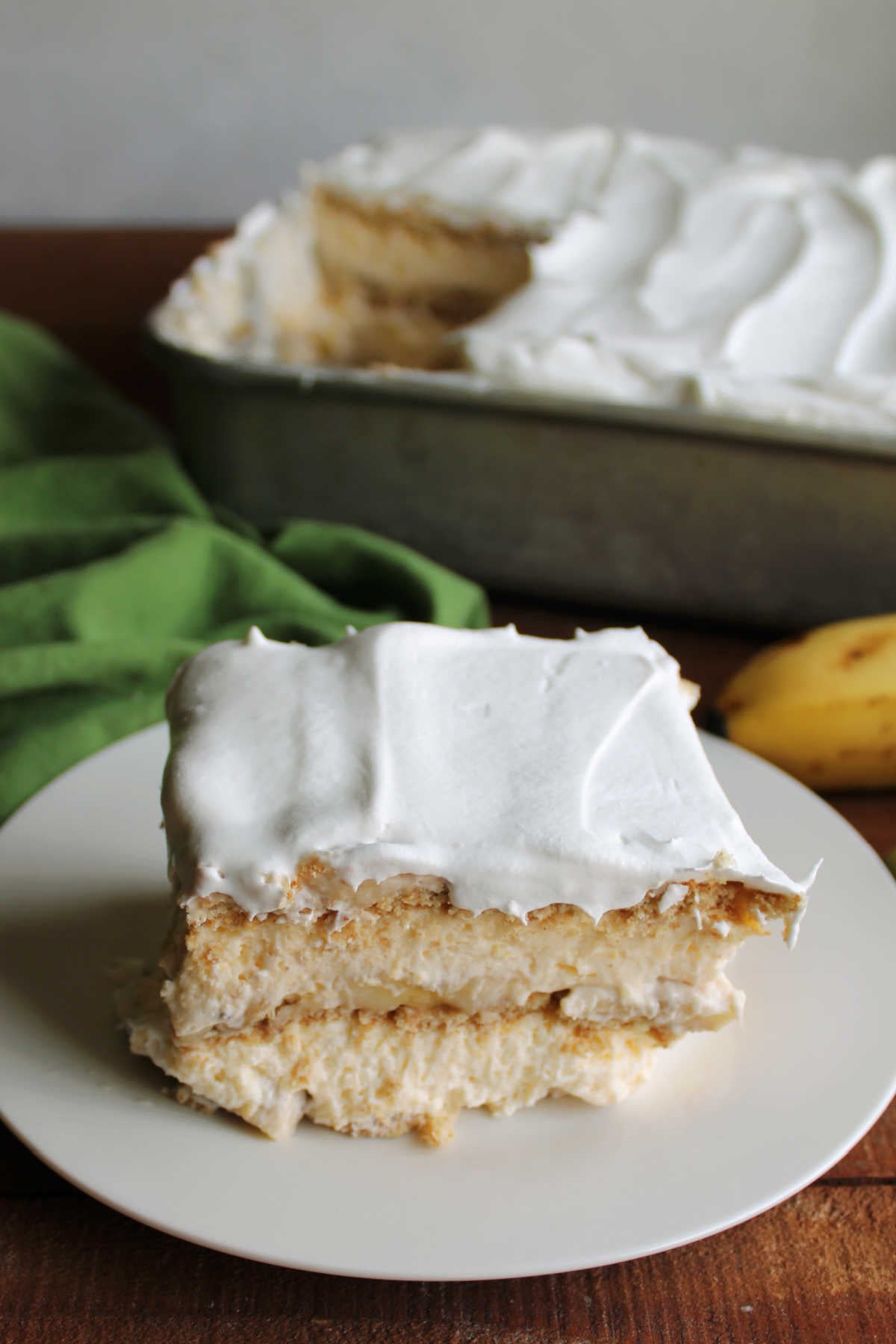Banana Pudding Icebox Cake 7 Big square piece of no bake banana pudding icebox cake on a plate, ready to eat.
