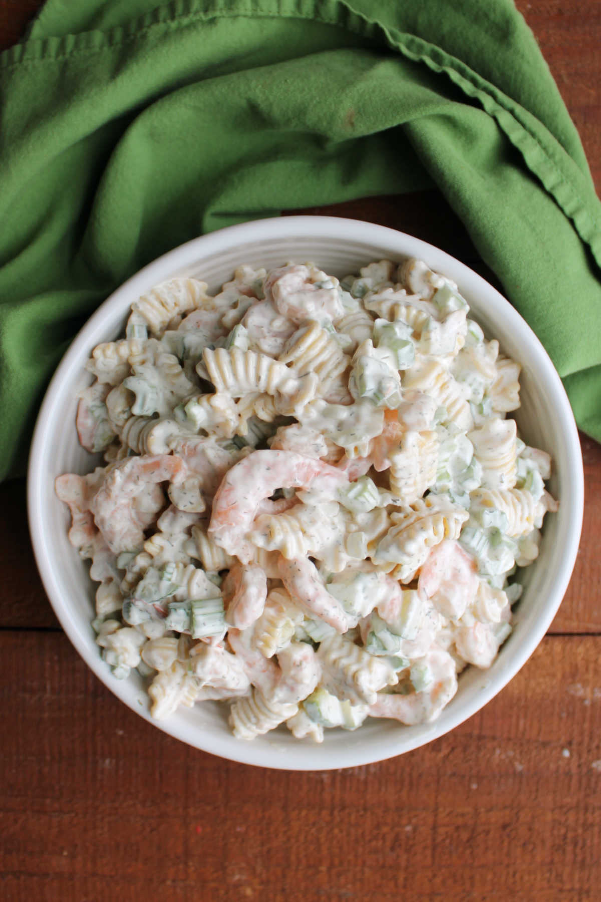 Shrimp Pasta Salad 10 Serving bowl filled with homemade creamy shrimp macaroni salad with lemon dill dressing and lots of shrimp and veggies.