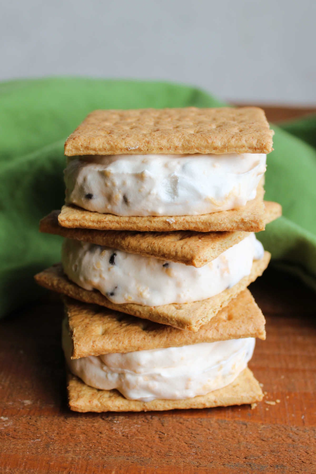 Stack of 3 frozen icebox sandwich cookies, ready to eat. 