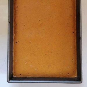 Grandma's Pumpkin Pie Bars 15 Partially baked pumpkin pie bars, ready for the topping.